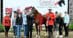 An arabian horse with a group of people and RCMP officers.