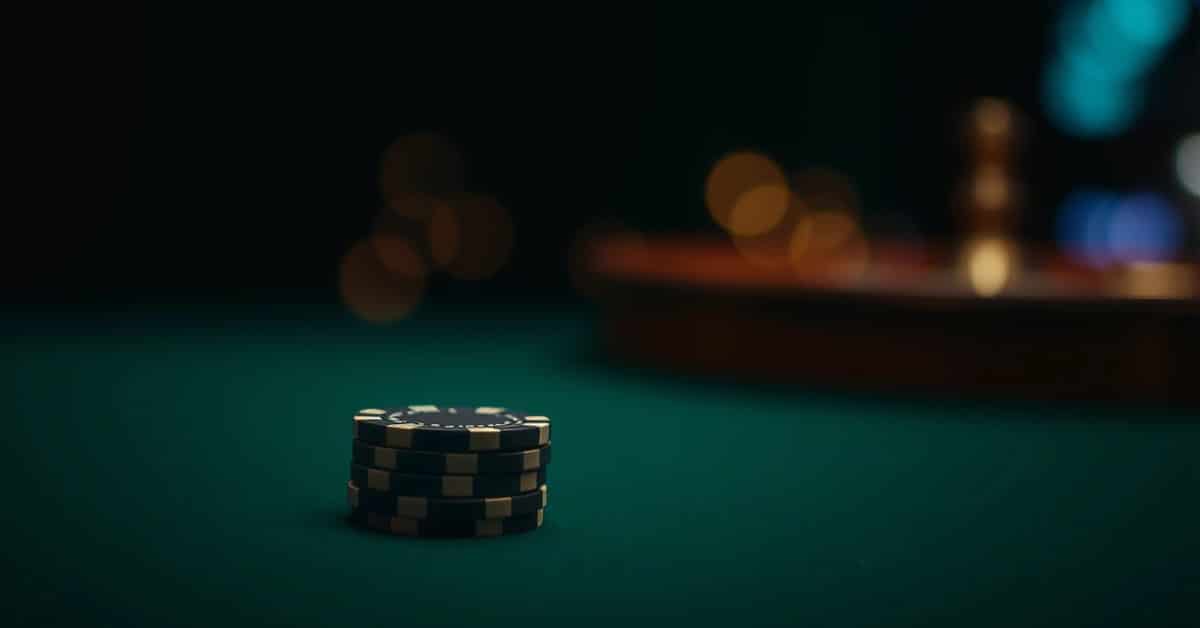 Poker chips and a roulette wheel.